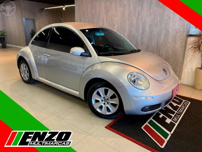 VOLKSWAGEN - NEW BEETLE 2.0 MI 8V 2P MANUAL - 2006/2007 - PRATA - R$ 37.900,00